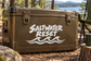 Vinyl decal with white 'Saltwater Reset' lettering and wave line graphic