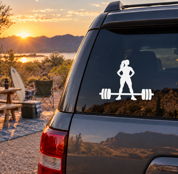 White weightlifting vinyl decal of female figure lifting barbell on car window