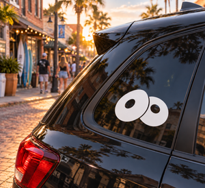Vinyl decal with two overlapping black circles and white dots for car windows