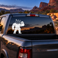 Vinyl weightlifting rhino decal on truck rear window, holding a dumbbell