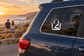 Black-and-white tote bag vinyl decal on car window
