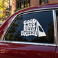 Vinyl windsurfing decal: 'Good Days Need Breeze' with white sail on car window