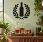 Wine bottle and laurel vinyl decal, black bottle with wreath leaves on wall