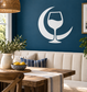 Wine glass crescent vinyl decal, white design on blue wall
