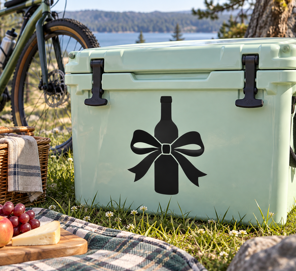 Black wine bottle bow vinyl decal on light green cooler front, centered graphic