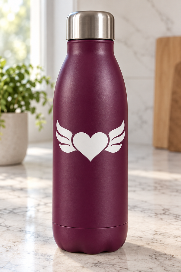 Vinyl heart wing decal on a maroon bottle, white heart with wing outlines