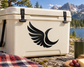 Black wing and crescent moon vinyl decal on a light cooler lid