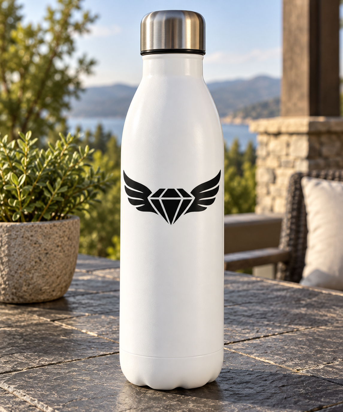 Black wing and diamond vinyl decal logo on a white bottle