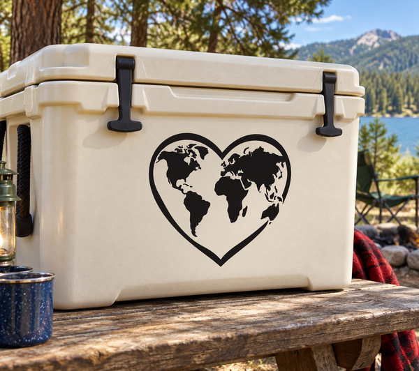 Heart-shaped vinyl decal with black world map on light background