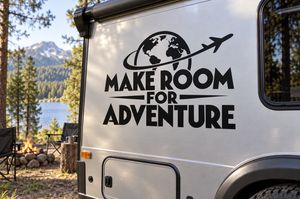 Vinyl decal with globe, airplane, and bold text “Make Room for Adventure” on camper door