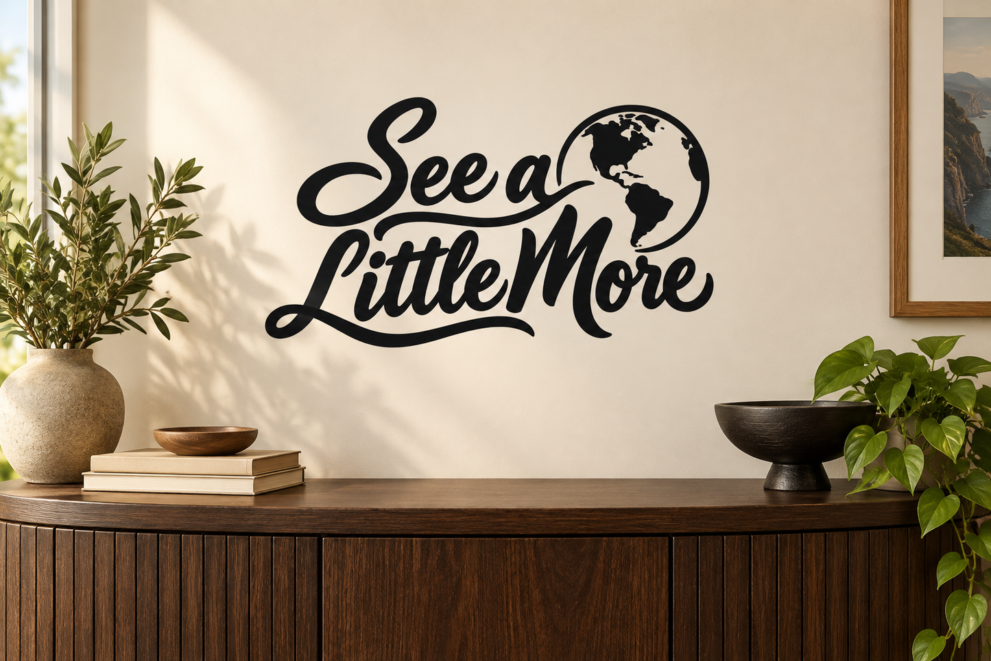Vinyl wall decal with “See a Little More” script and globe world map icon