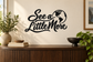 Vinyl wall decal with “See a Little More” script and globe world map icon