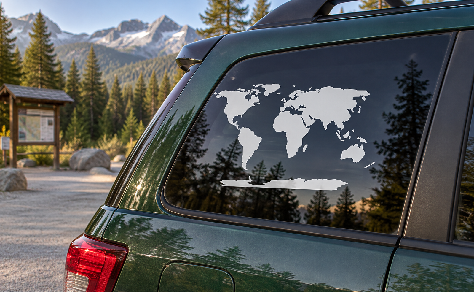 World map vinyl decal on car window: white continents on dark background