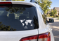 World map vinyl decal with triangle symbol on car rear window