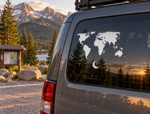 World vinyl decal with black world map and crescent moon on car window