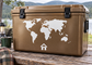 World map vinyl decal with house icon, white on brown surface