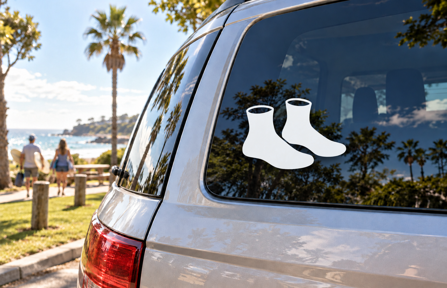 Wrestling shoe pair vinyl decal with two white-outlined black shoes