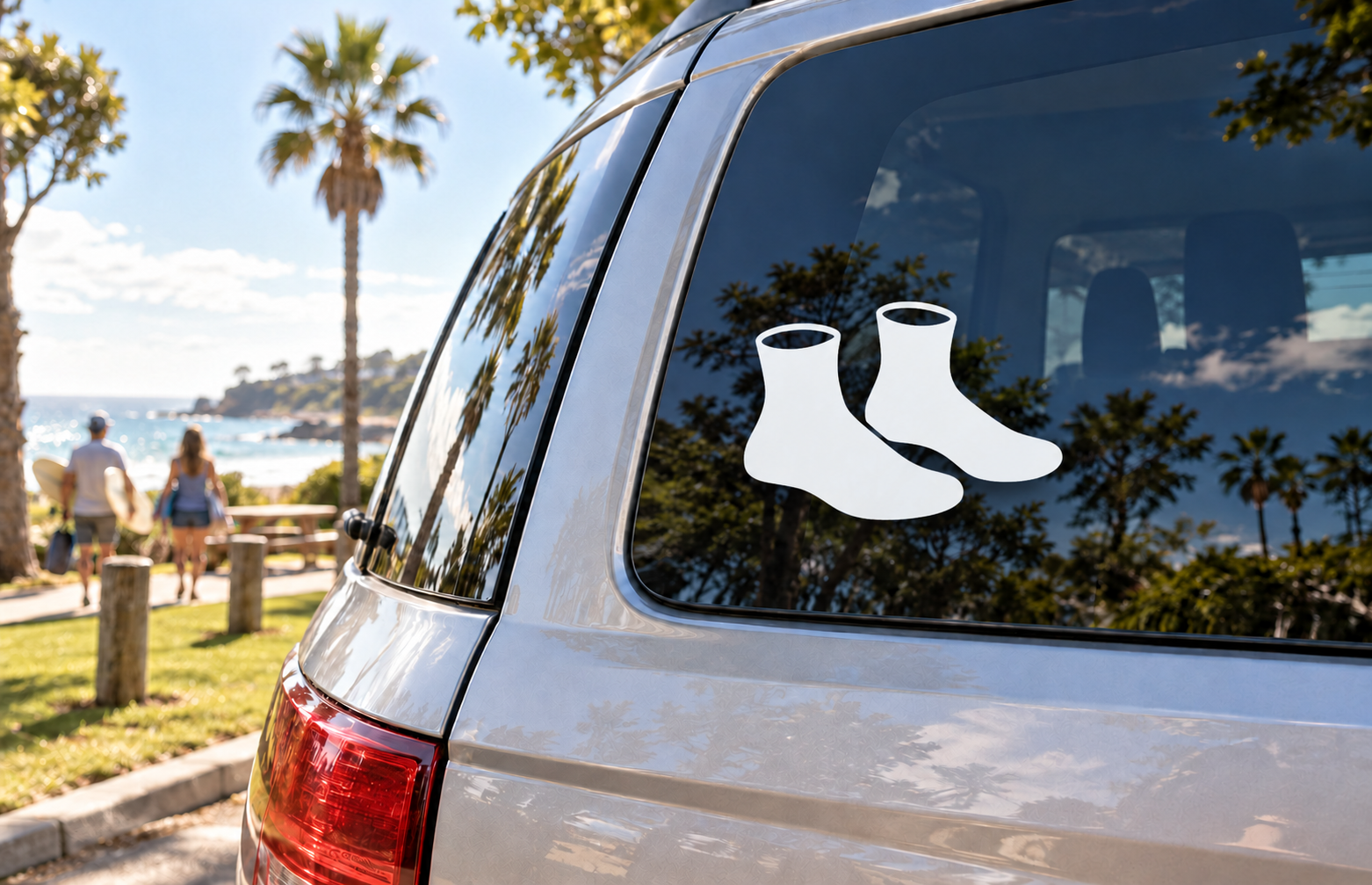 Wrestling shoe pair vinyl decal with two white-outlined black shoes