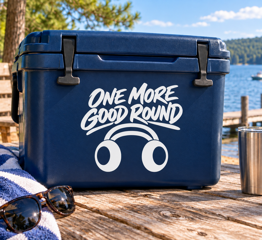 Vinyl decal with “ONE MORE GOOD ROUND” text and cartoon headphones on a blue surface