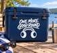Vinyl decal with “ONE MORE GOOD ROUND” text and cartoon headphones on a blue surface