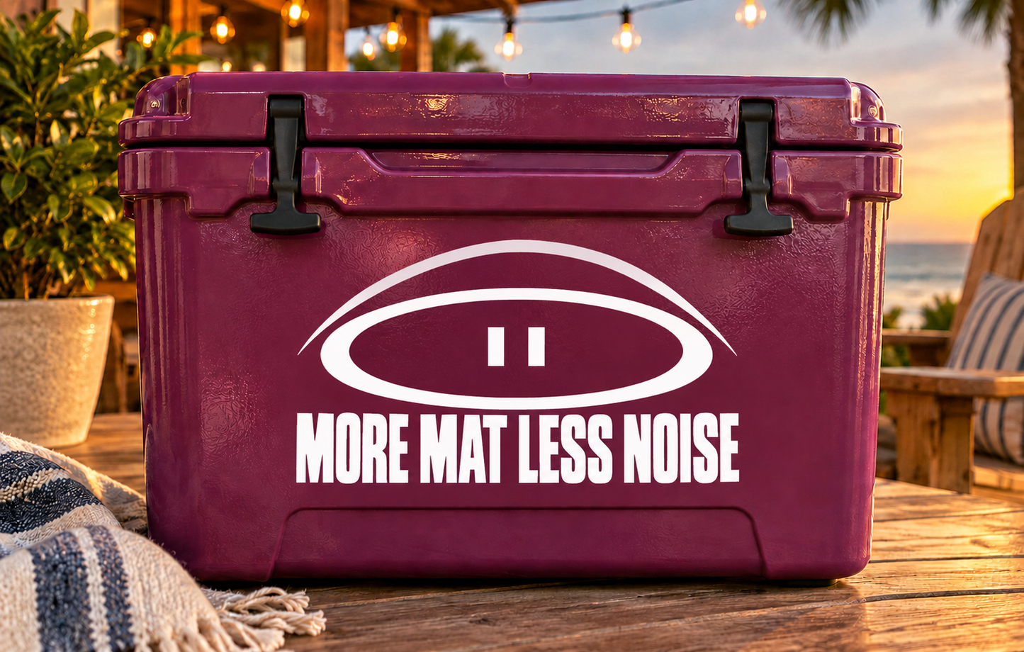 Vinyl decal with white eye logo and "MORE MAT LESS NOISE" text on maroon