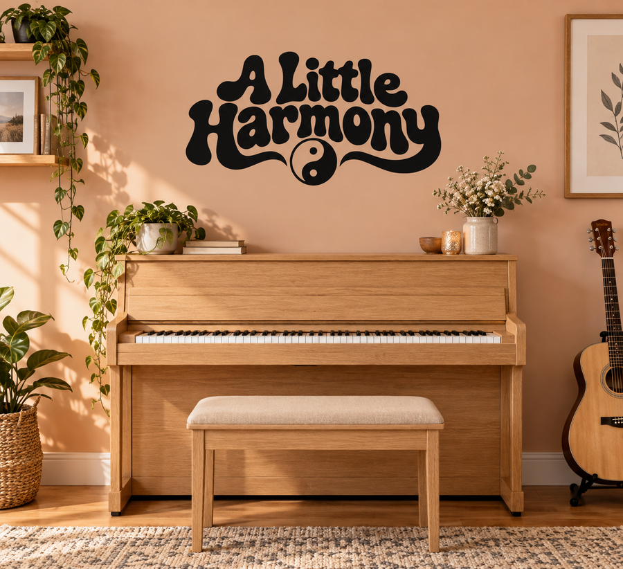 Black vinyl wall decal reading 'A Little Harmony' with yin-yang