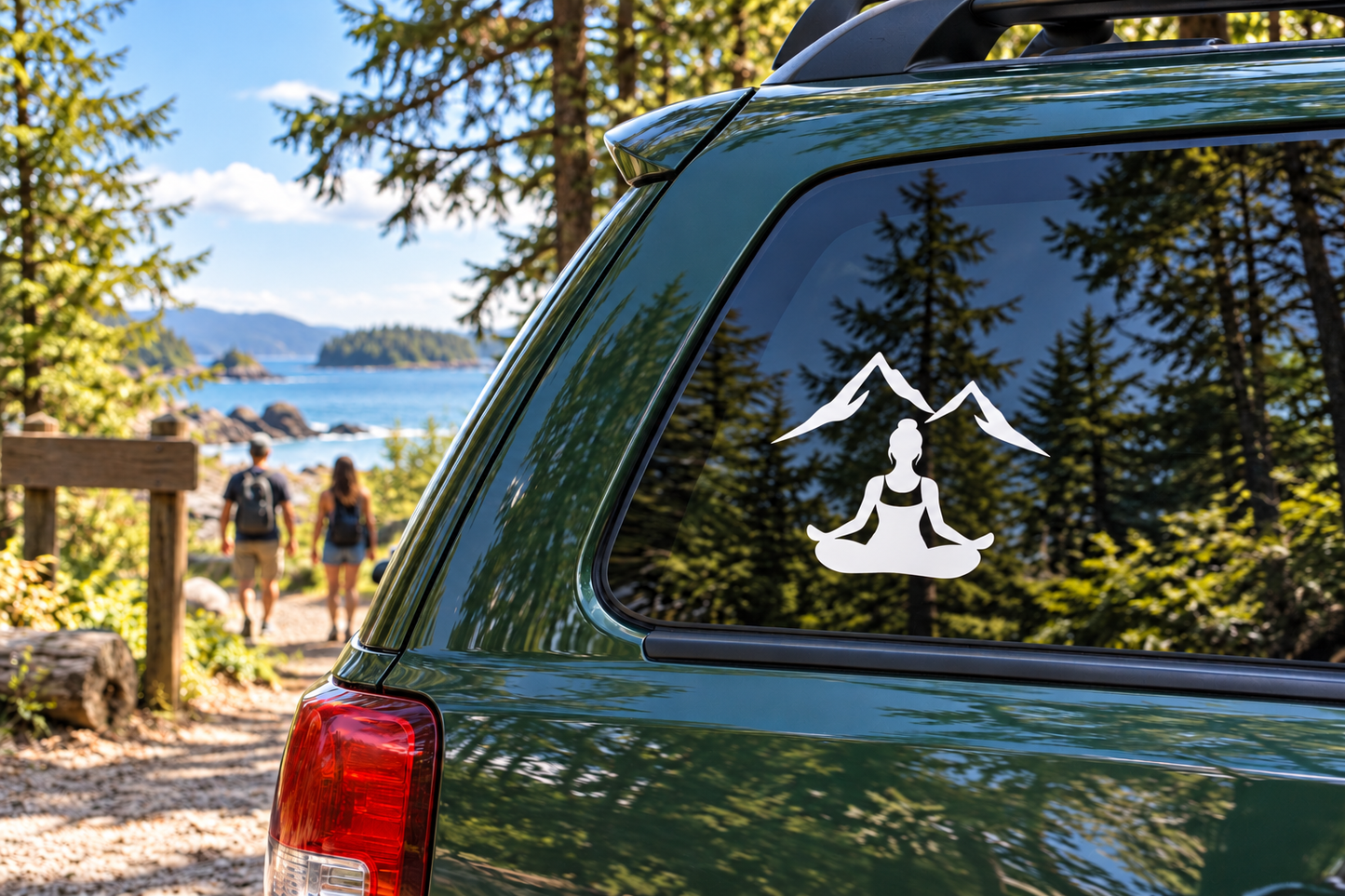 Yoga mountain meditation vinyl decal on car window: seated woman meditating between mountains, white