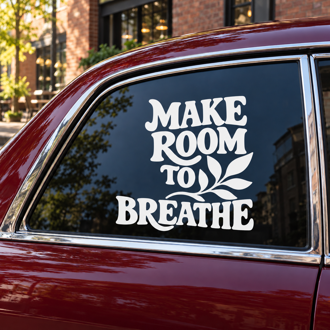 Yoga vinyl car window decal with text 'MAKE ROOM TO BREATHE' and leaf icon