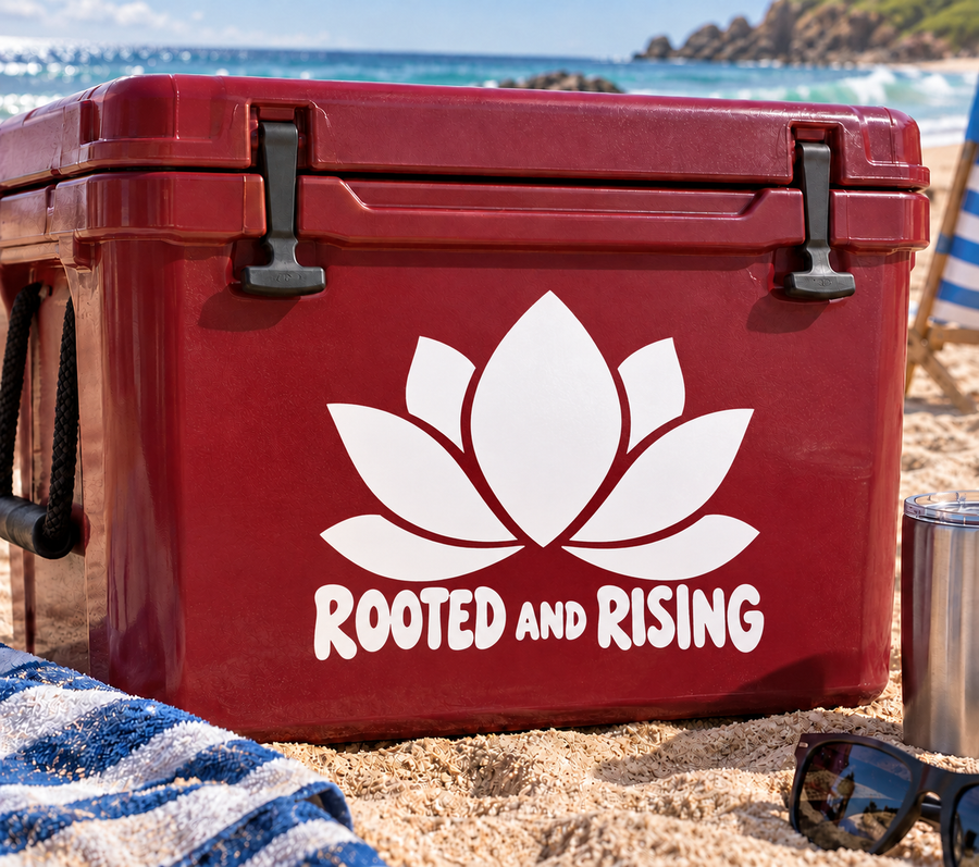 Yoga vinyl decal: white lotus and 'ROOTED AND RISING' text on red