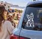 Yorkshire terrier sitting smile vinyl decal on car window, black and white