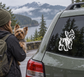Yorkshire Terrier vinyl decal on car rear window, white dog silhouette with trail tail