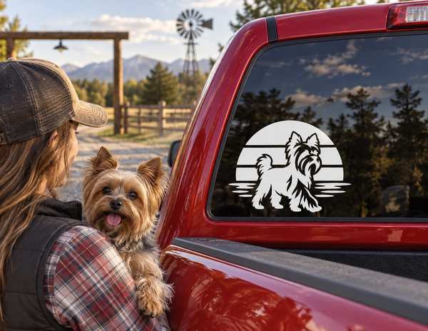 Black and white Yorkshire terrier vinyl decal with stripe backdrop on car window