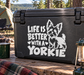Yorkshire terrier vinyl decal on black case with “Life is better with a Yorkie” text.