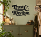 Trust Your Rhythm vinyl wall decal with moon and sparkle icons, black lettering