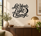 Vinyl wall decal with script “Let Your Light Change” and crescent moon with stars
