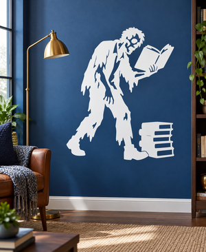 White zombie bookworm vinyl decal silhouette holding an open book and standing near stacked books