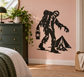 Zombie camper vinyl decal featuring a zombie holding a lantern beside a tent and campfire