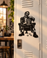 Zombie popcorn vinyl decal of zombie seated at table with accordion and popcorn pieces