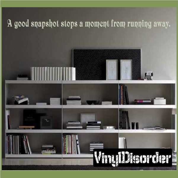 Wall decal quote: 'A good snapshot stops a moment from running away'