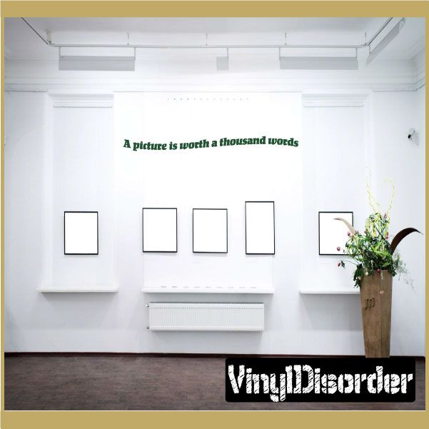 Wall decal with text reading "A picture is worth a thousand words"