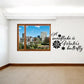 Wall quote decal with cursive text and black snowflake and butterfly icons