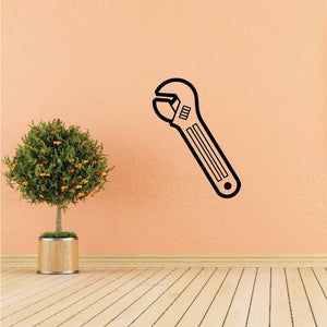 Adjustable metal hand wrench decal with black outline line-art design