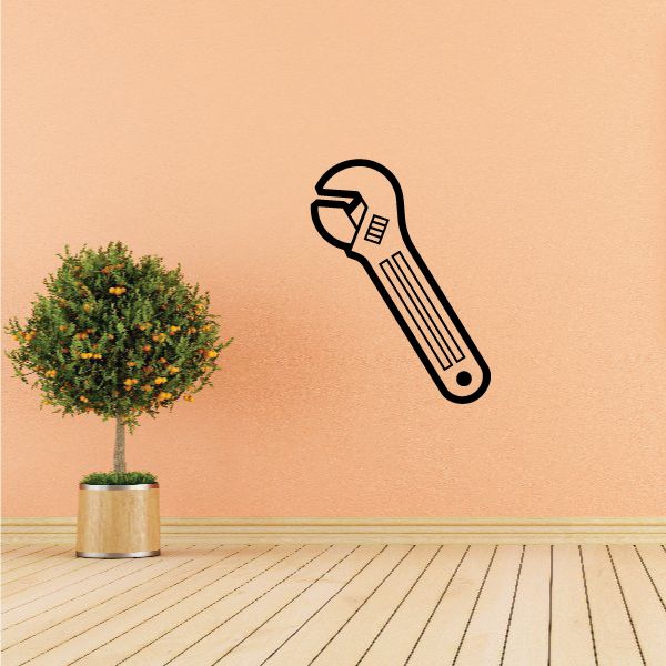 Adjustable metal hand wrench decal with black outline line-art design