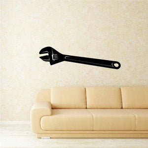 Black adjustable wrench wall decal with open-end head and looped handle