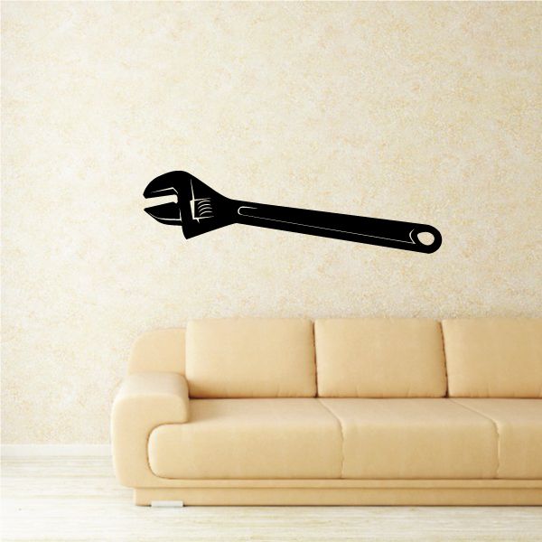 Black adjustable wrench wall decal with open-end head and looped handle