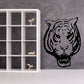 Tiger head decal, black and white roaring design with bold outline