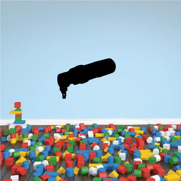 Air nibbler decal with black tool and colorful plastic blocks piled below