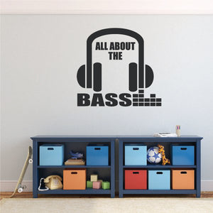 Headphone wall decal with bold 'ALL ABOUT THE BASS' text