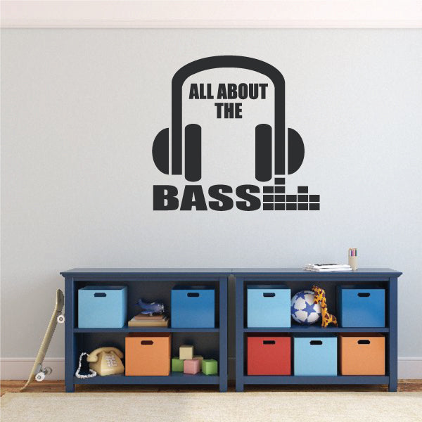 Headphone wall decal with bold 'ALL ABOUT THE BASS' text