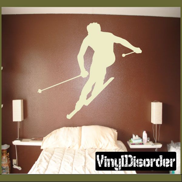 Alpine skiing decal of a skier silhouette holding ski poles and skis